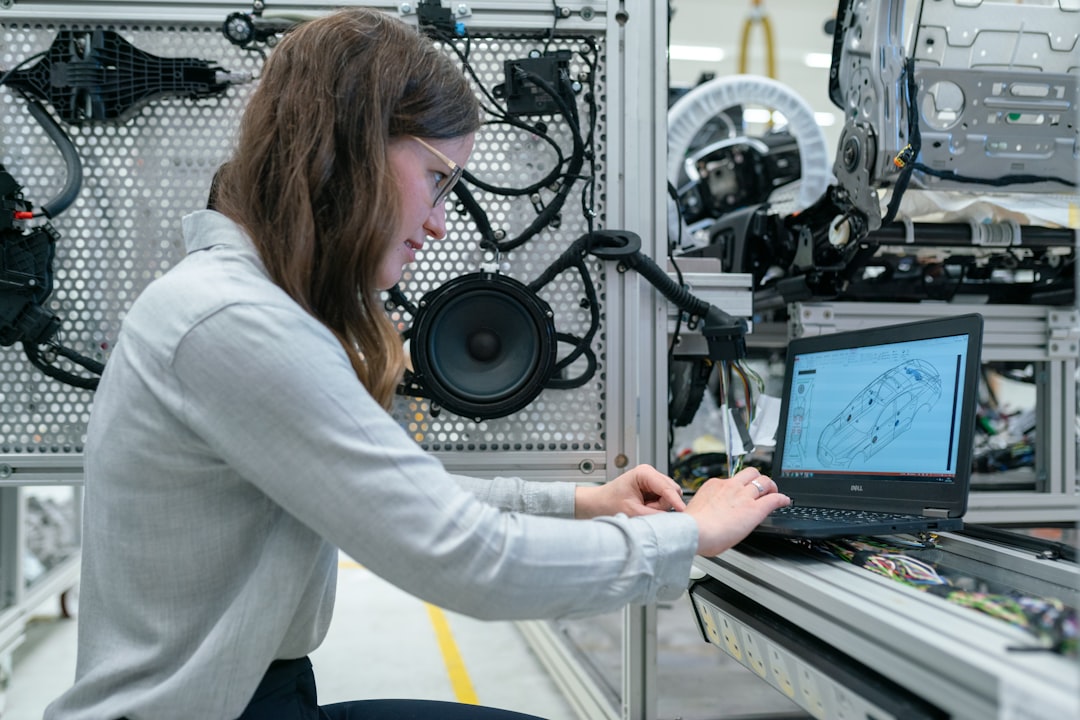 Female electronics engineer runs vehicle tests